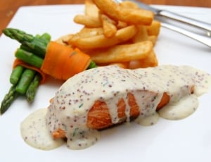 green and orange dish with creamy sauce thumbnail