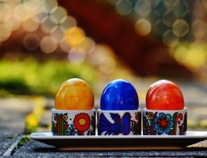 yellow, blue, and red ball ornaments thumbnail