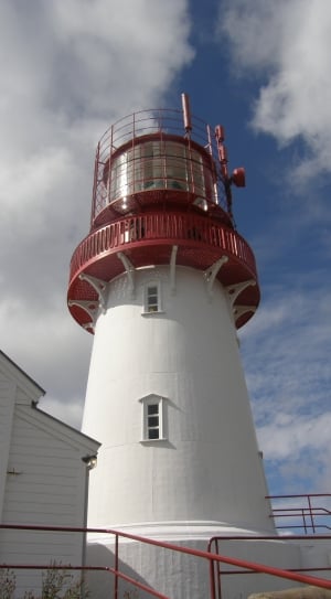 white and red lighthouse tower thumbnail