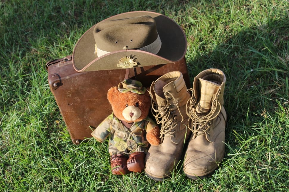 cowoby hat, boots, teddy bear and suit case preview
