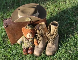 cowoby hat, boots, teddy bear and suit case thumbnail