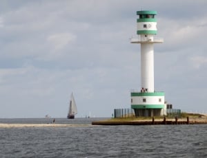 white and green lighthouse thumbnail