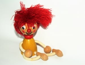 red haired wooden doll thumbnail