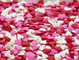 white red and pink hearts shaped candies thumbnail