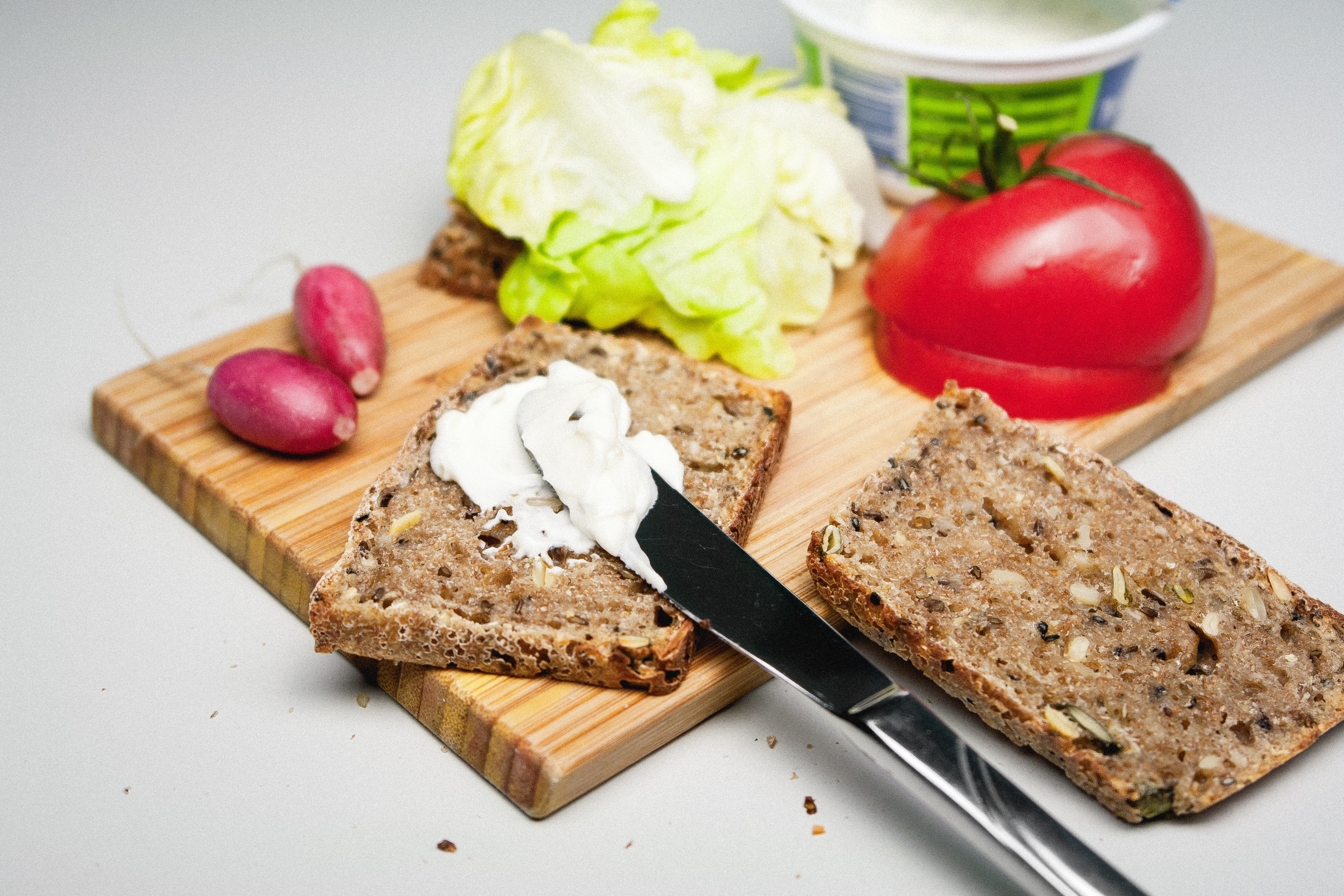 banana cake spread with mayonnaise and vegetables