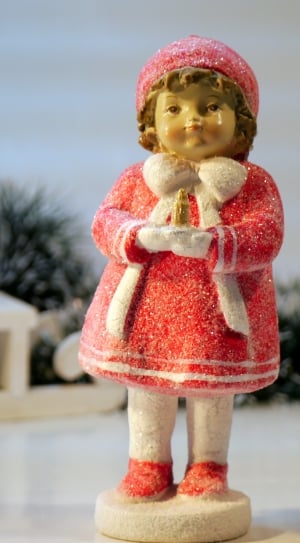 female child in red dress figurine thumbnail