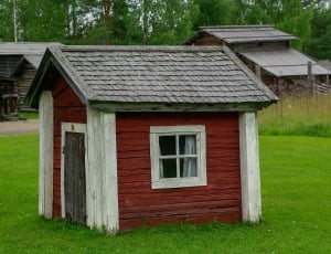 red white and gray wooden storage house thumbnail