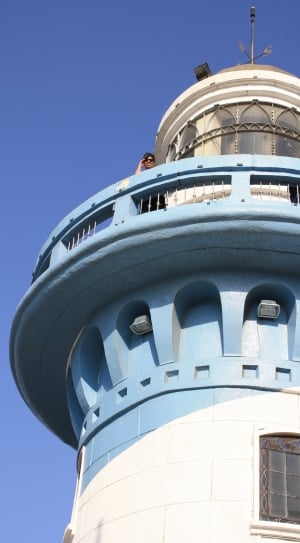 blue and white concrete lighthouse thumbnail