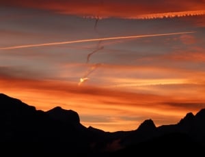 silhouette of a mountain in sunset thumbnail