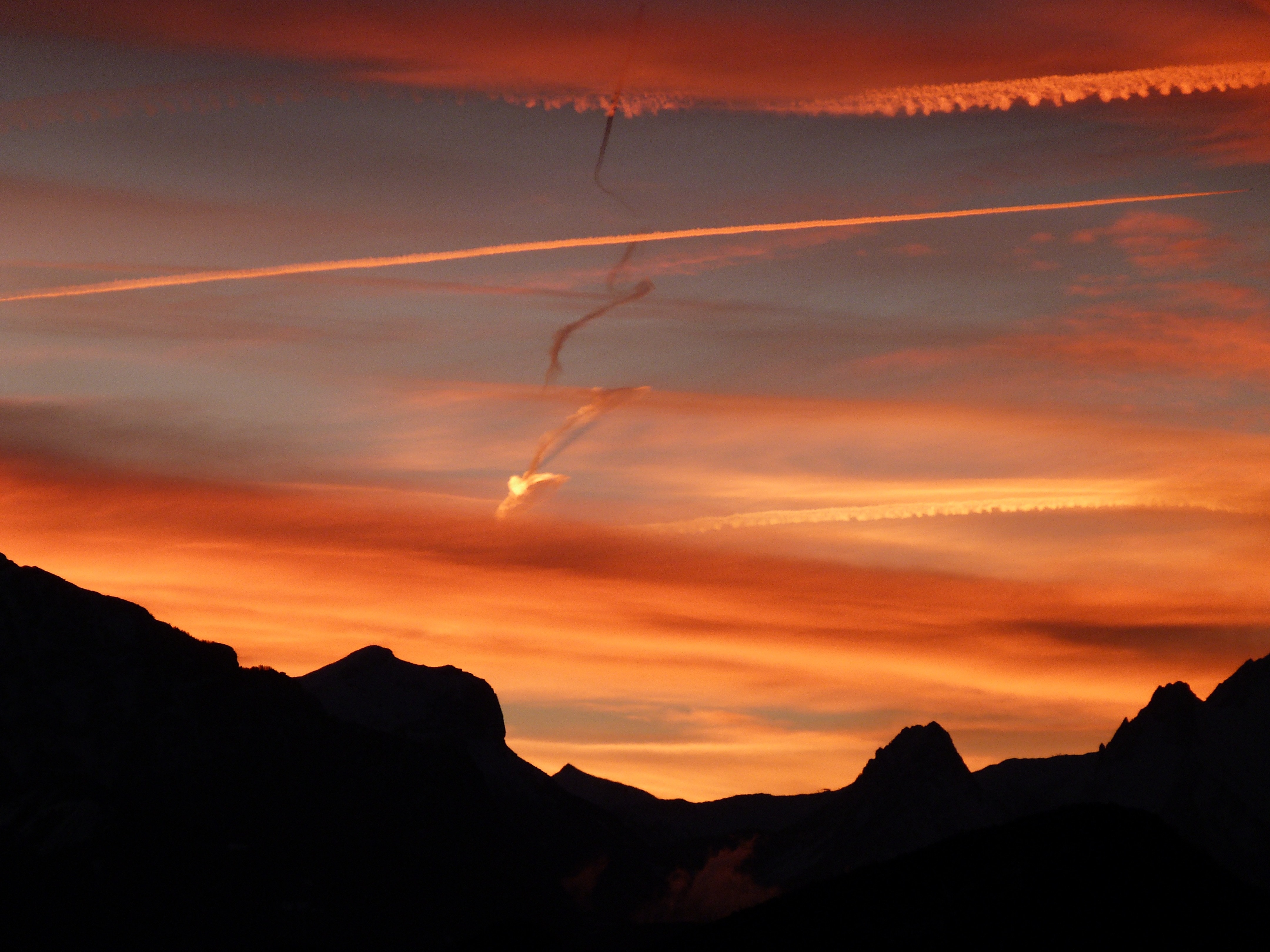 silhouette of a mountain in sunset