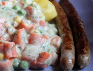 vegetable salad and 2 sausages thumbnail