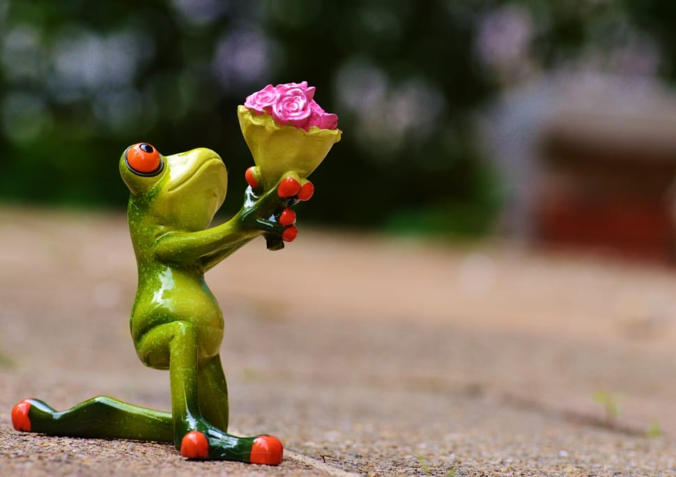 ceramic figure of green frog with flowers preview