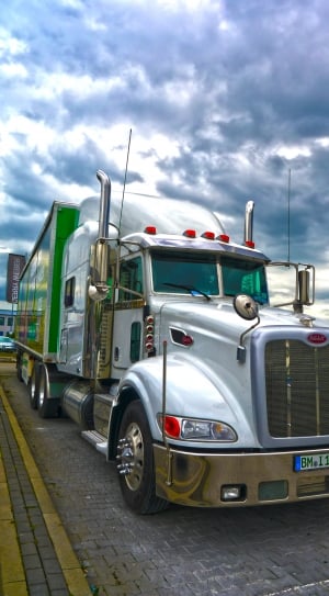 silver and green freight truck thumbnail