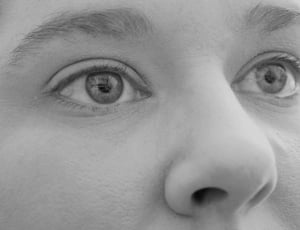 grayscale photo of woman's eyes and nose thumbnail