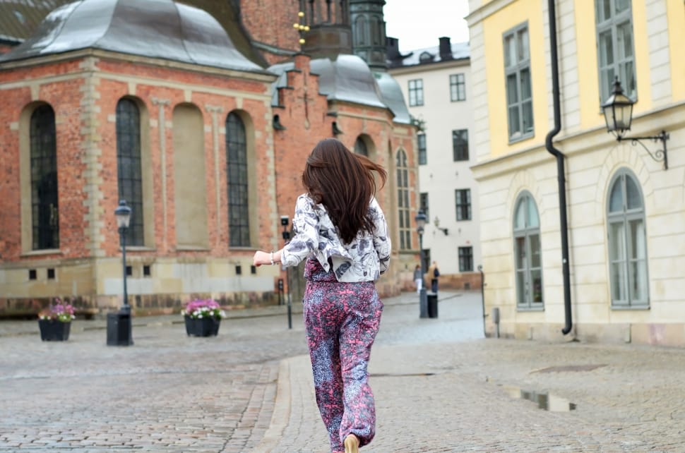 women's white floral long sleeve blouse and purple and blue pants preview