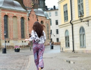 women's white floral long sleeve blouse and purple and blue pants thumbnail