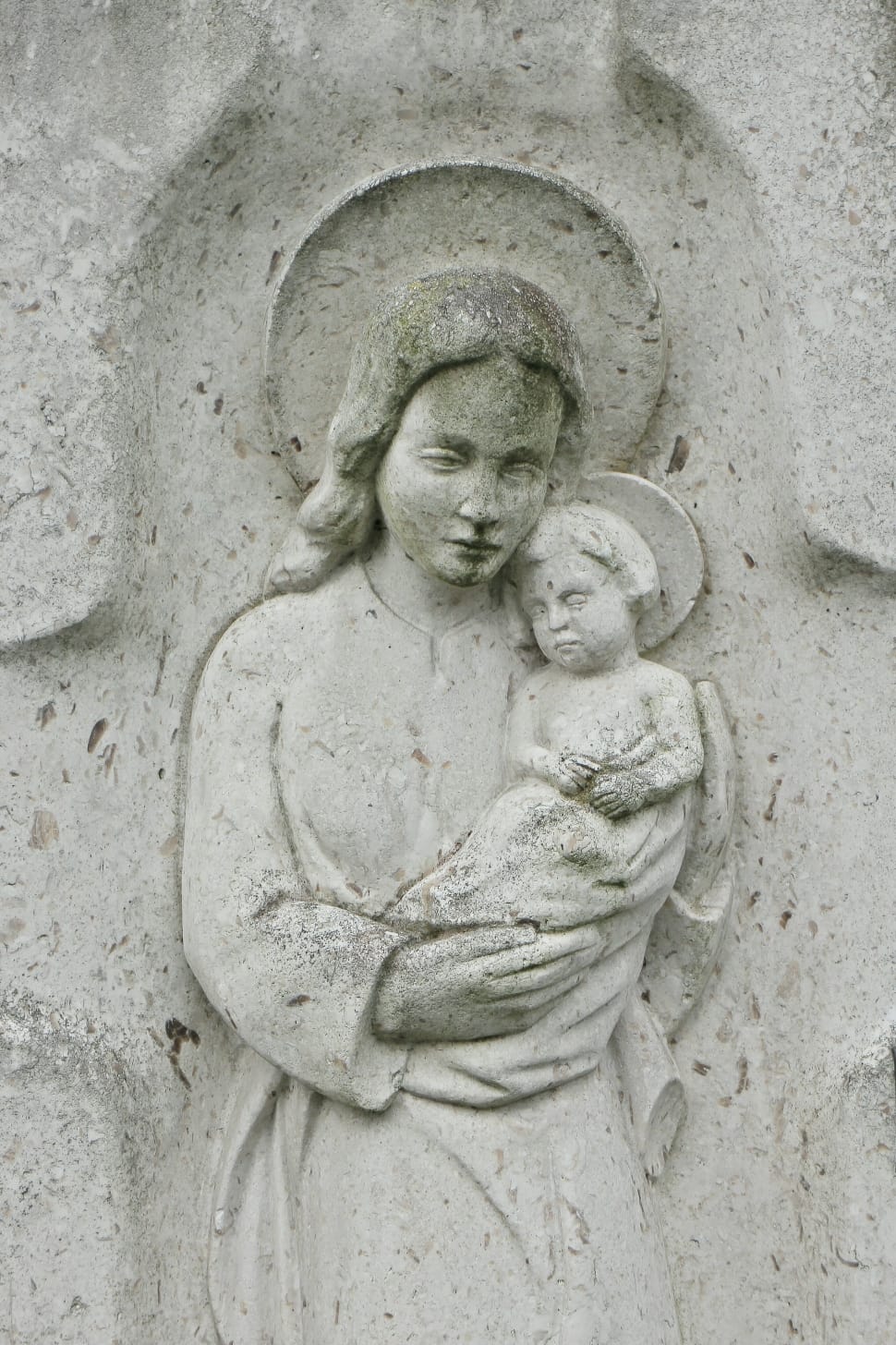 woman carrying baby statue preview