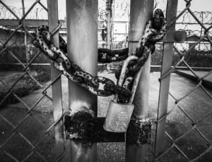 grayscale photography of chain and padlock thumbnail