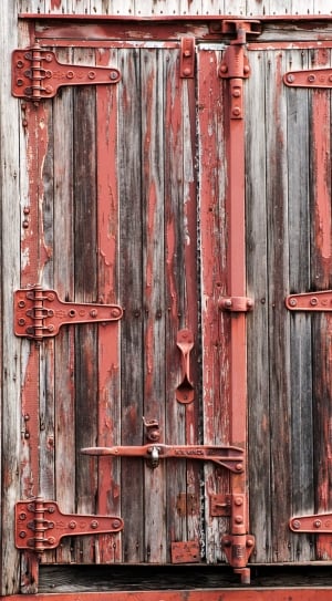 brown wooden with red metal door thumbnail