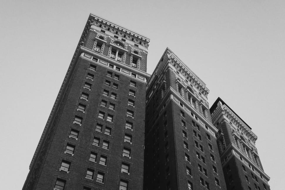 grayscale photo of 3 buildings preview
