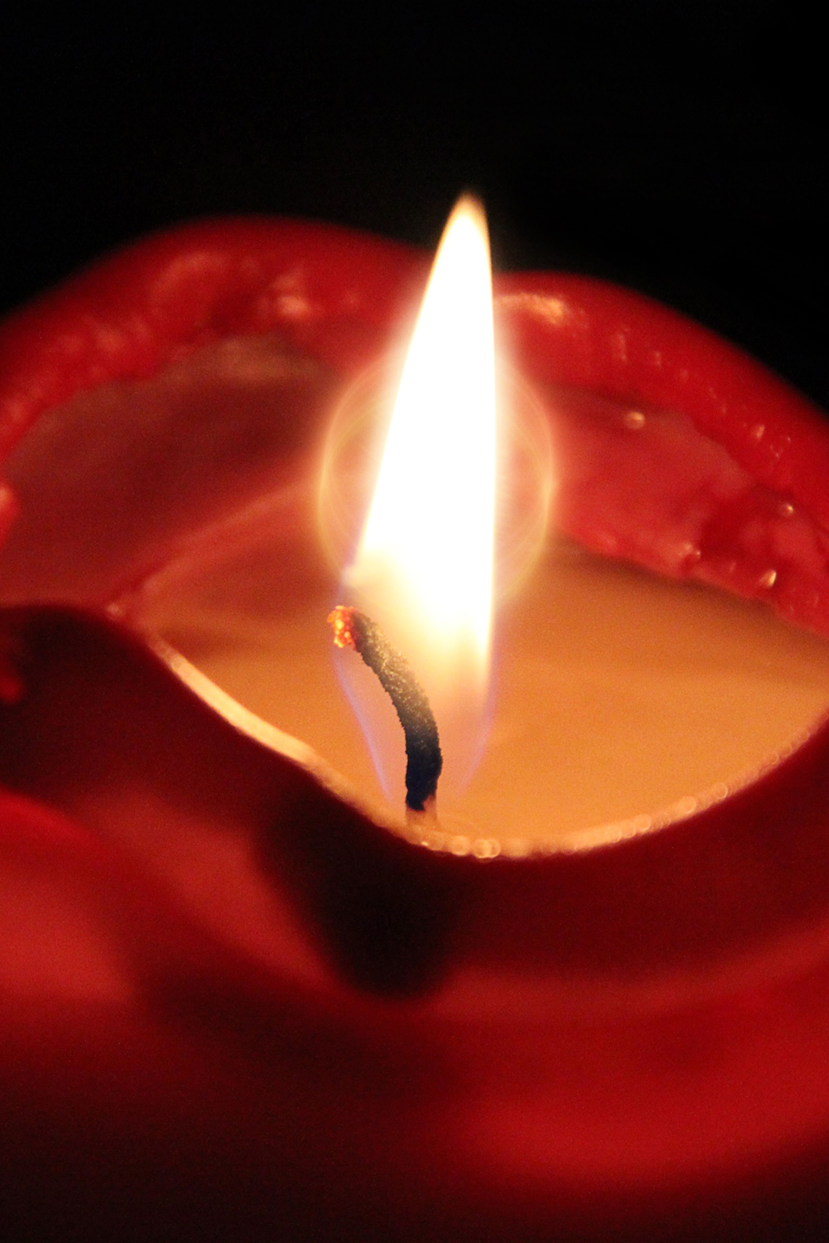 candle flame in close up photography