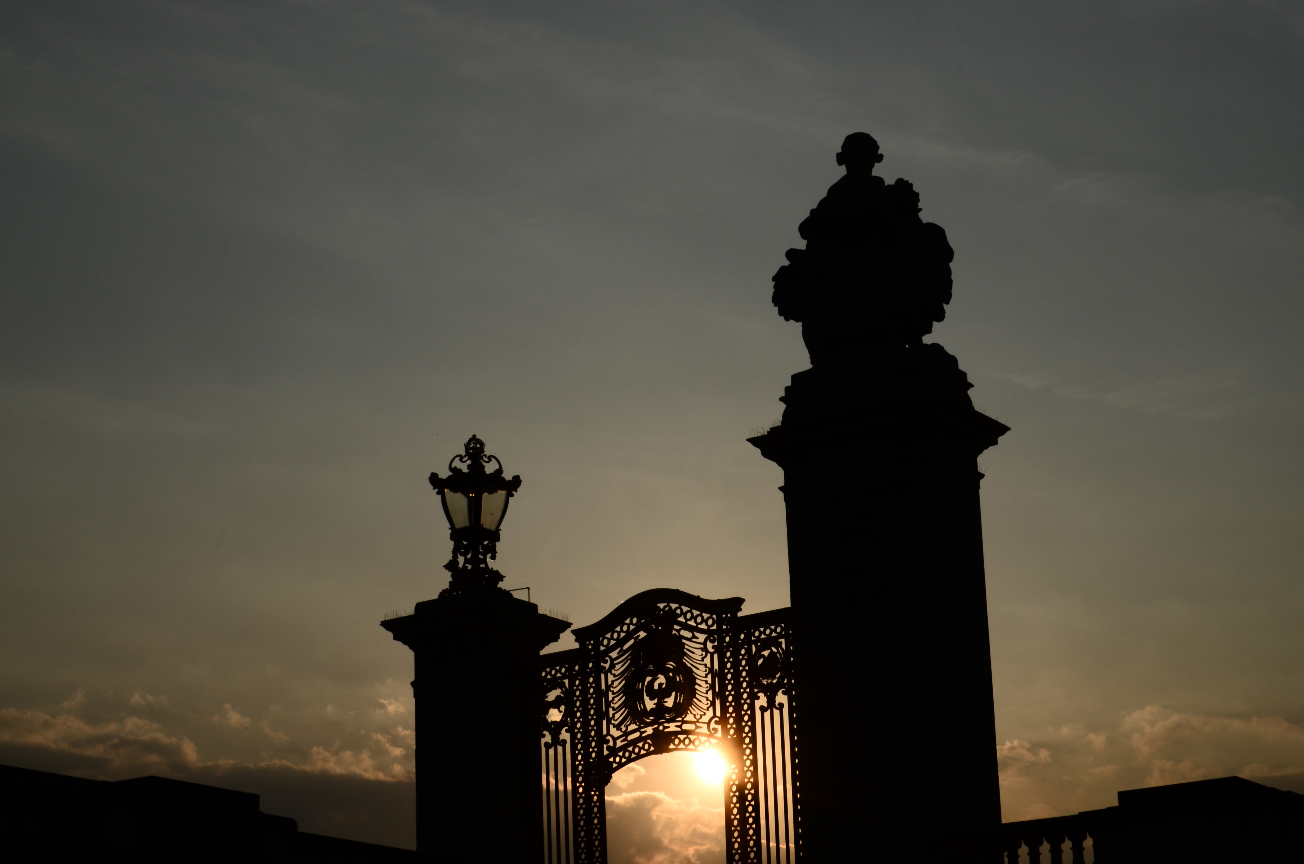 silhouette of gate during sunset