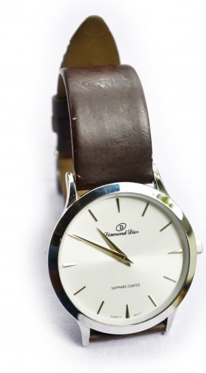 silver round analog watch with black leather strap thumbnail
