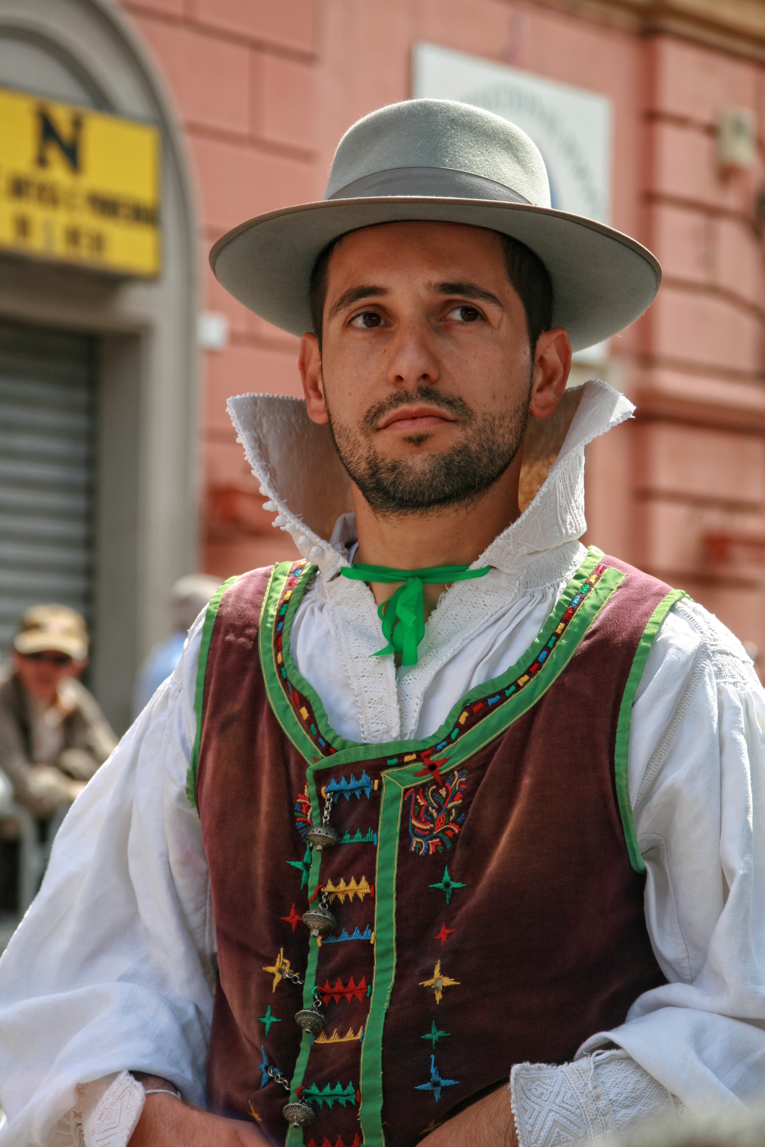 men's white hat and brown cowboy vest