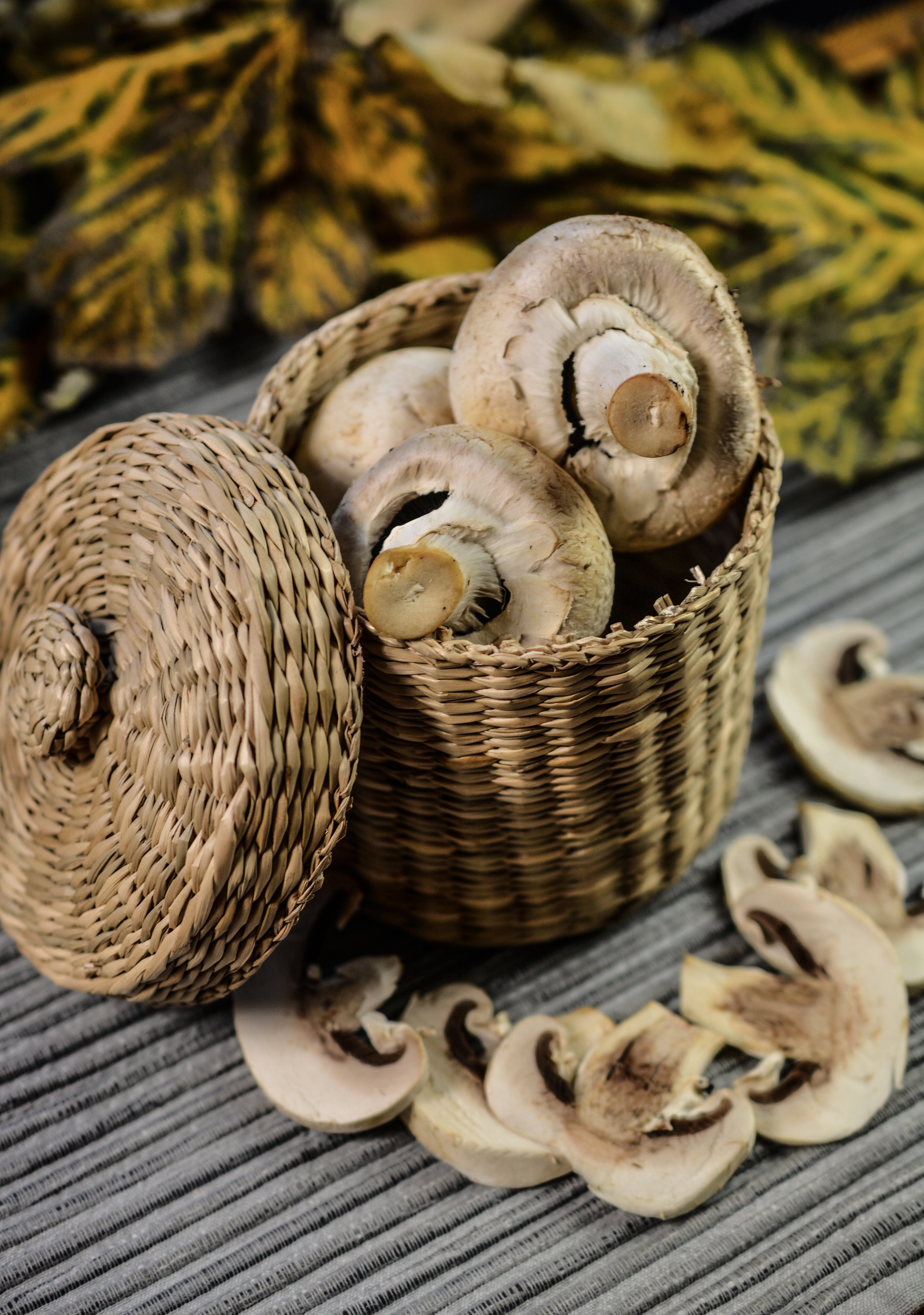 button mushrooms in wicker basket