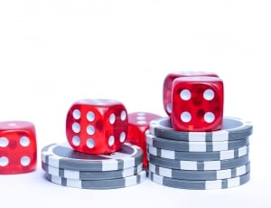 red and white dice and poker chips thumbnail