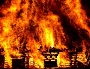 wooden pallets in fire photography thumbnail