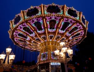 lighted amusement ride during night time thumbnail