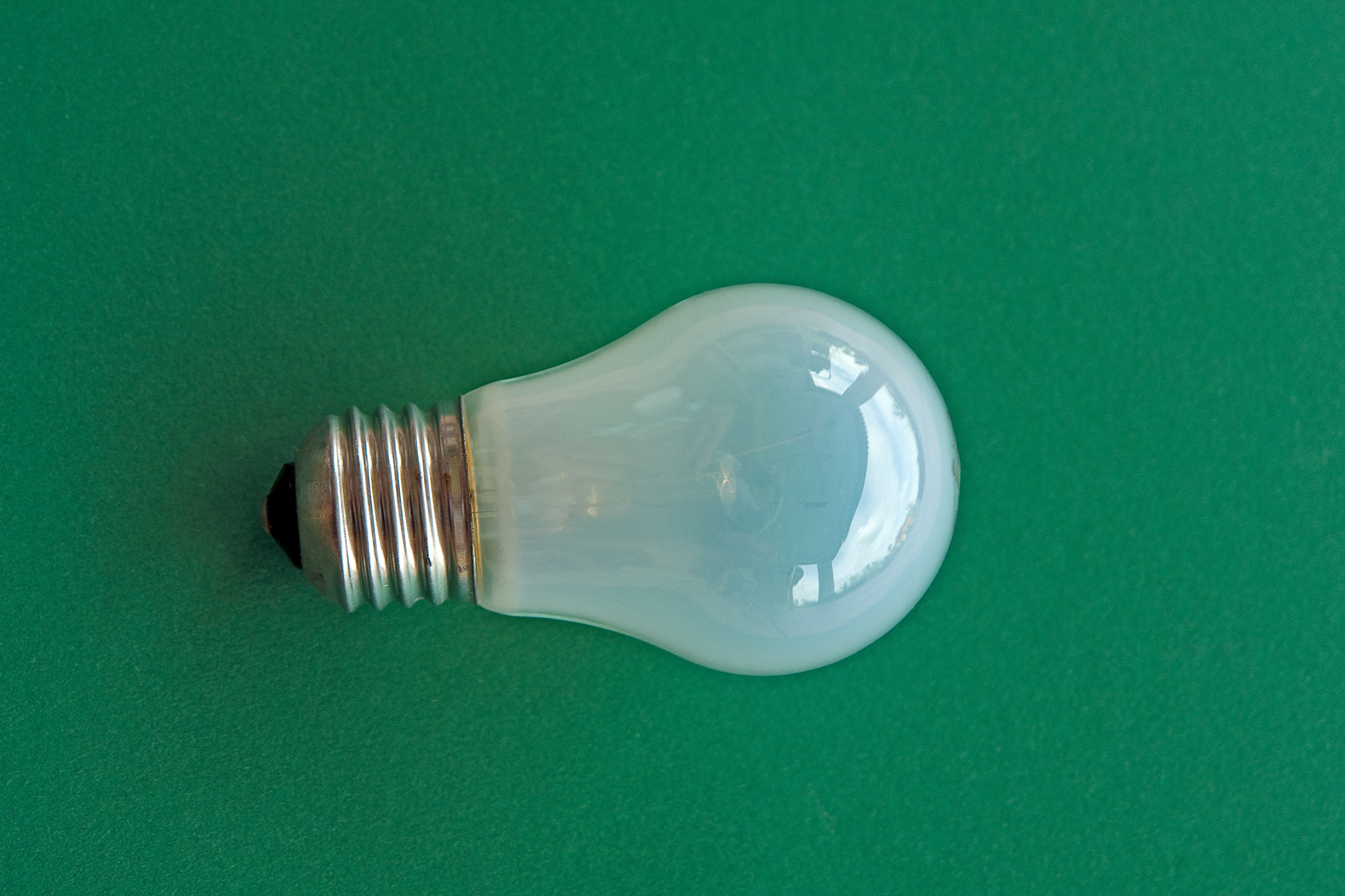 white glass light bulb