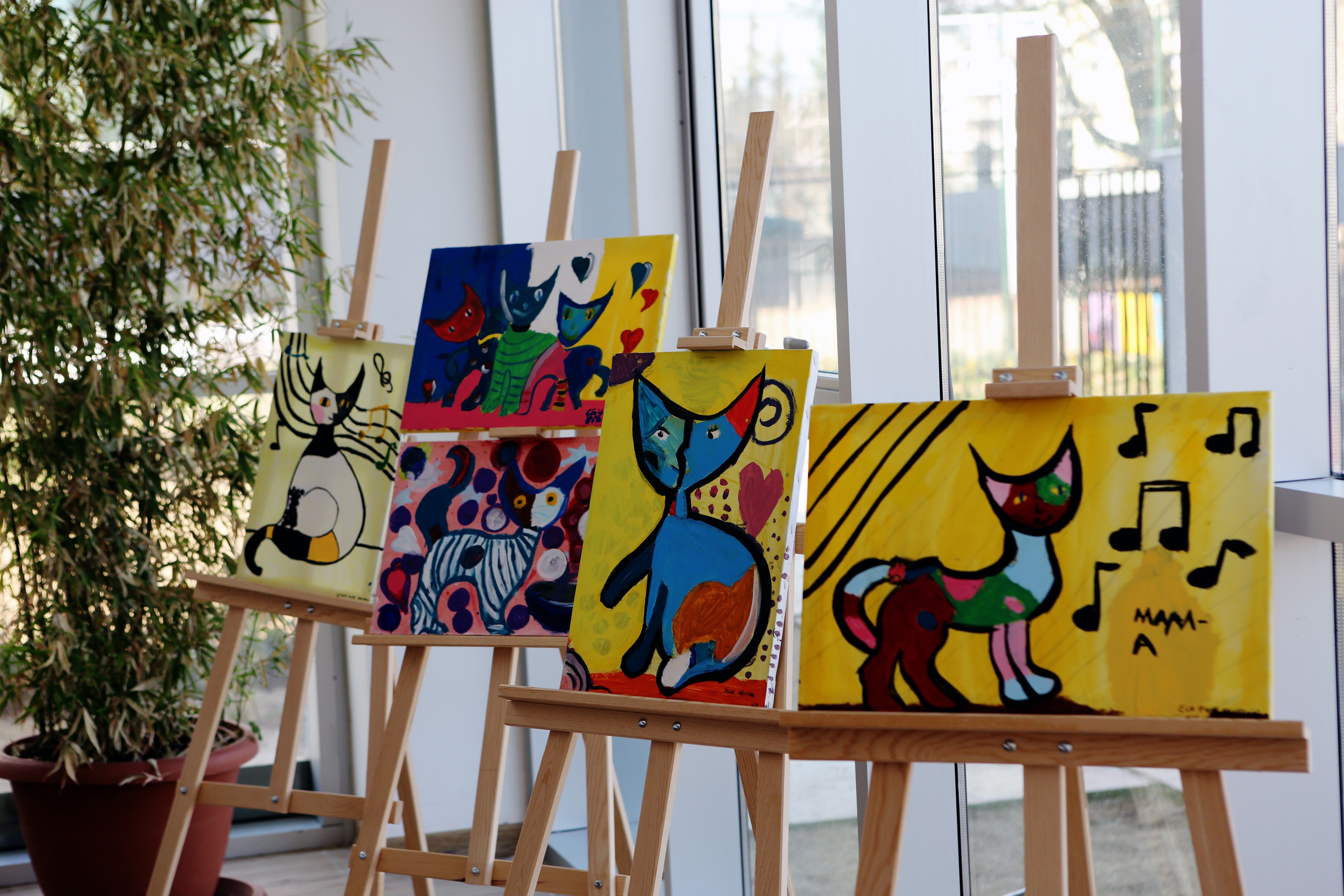 five cat paintings