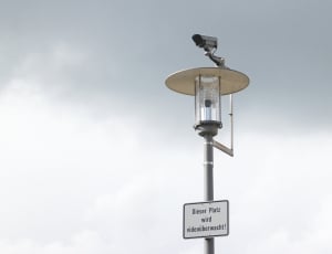gray-and-beige solar street light with cctv camera thumbnail