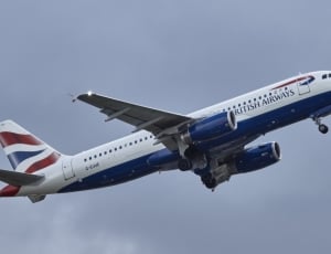 white blue and red airplane thumbnail