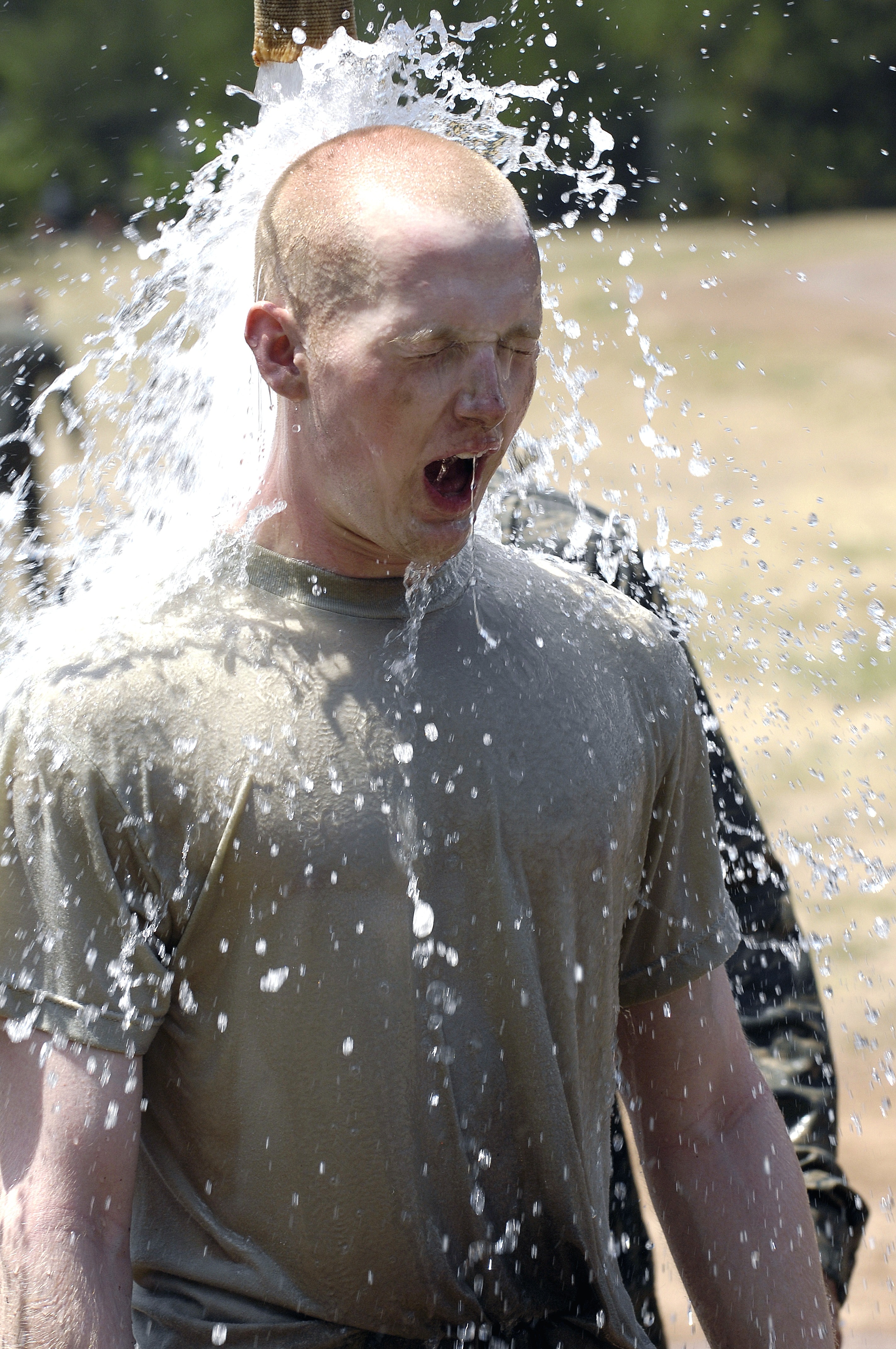 military trainee got bathed with fire hose