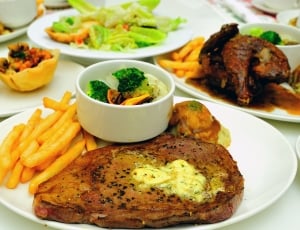 french fries meat steak and vegetable bowl with plate thumbnail