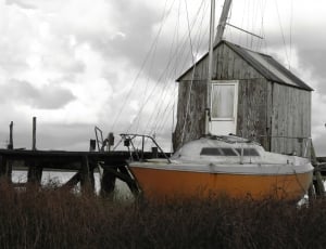 white and orange boat thumbnail