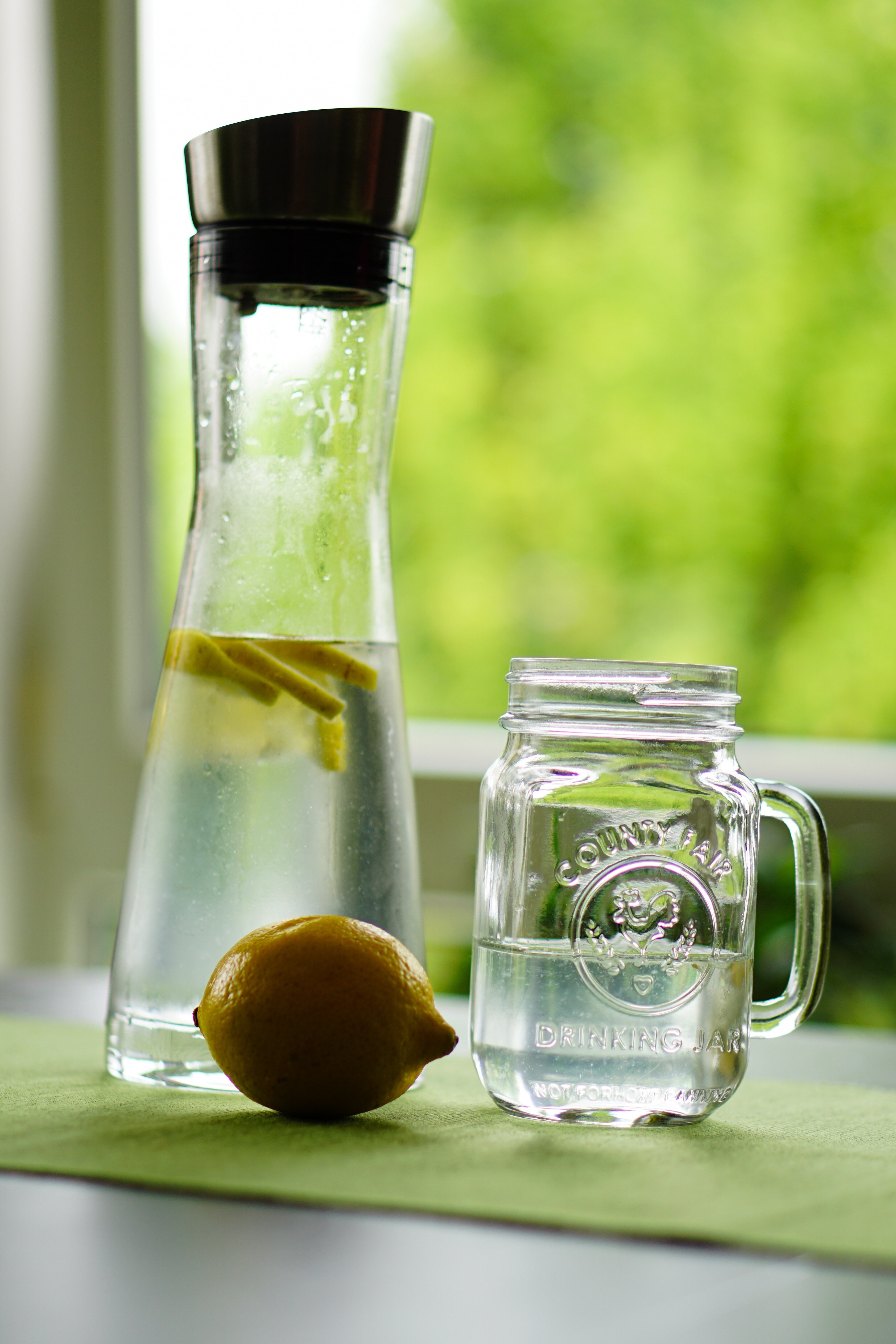 clear glass mug and pitcher