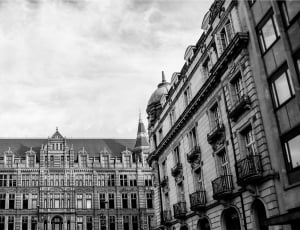 gray scale photography of buildings thumbnail