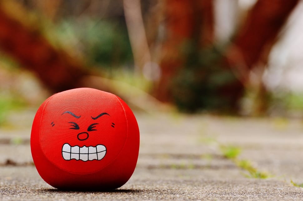red plastic round toy preview