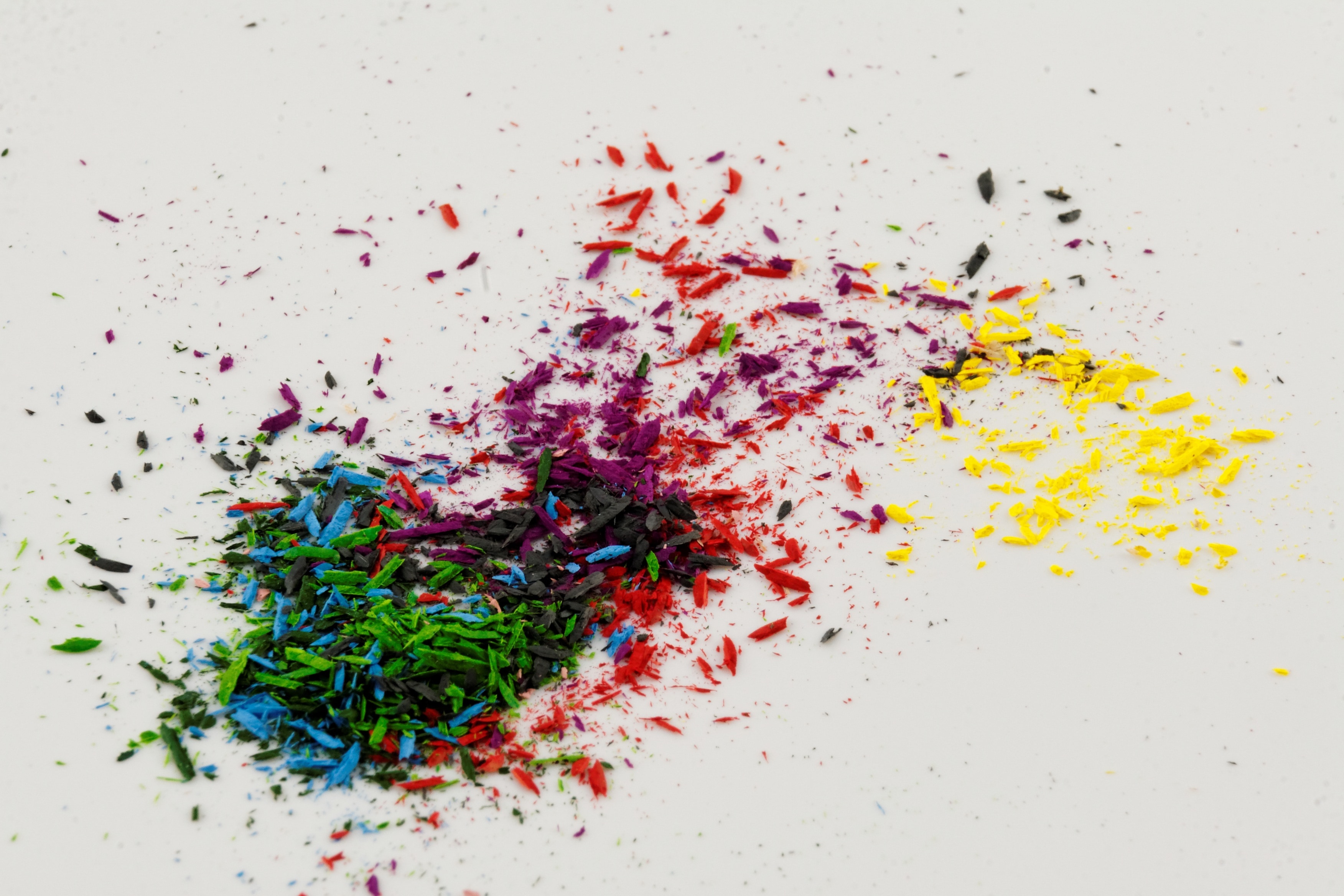 assorted color of powder on white surface