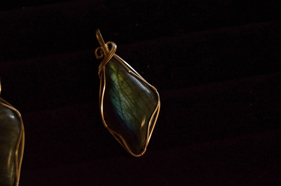 pair of bronze framed emerald pendant earrings preview