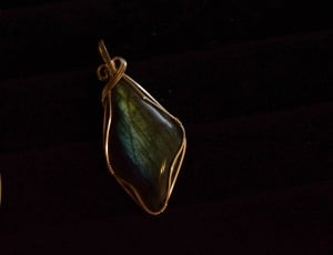 pair of bronze framed emerald pendant earrings thumbnail