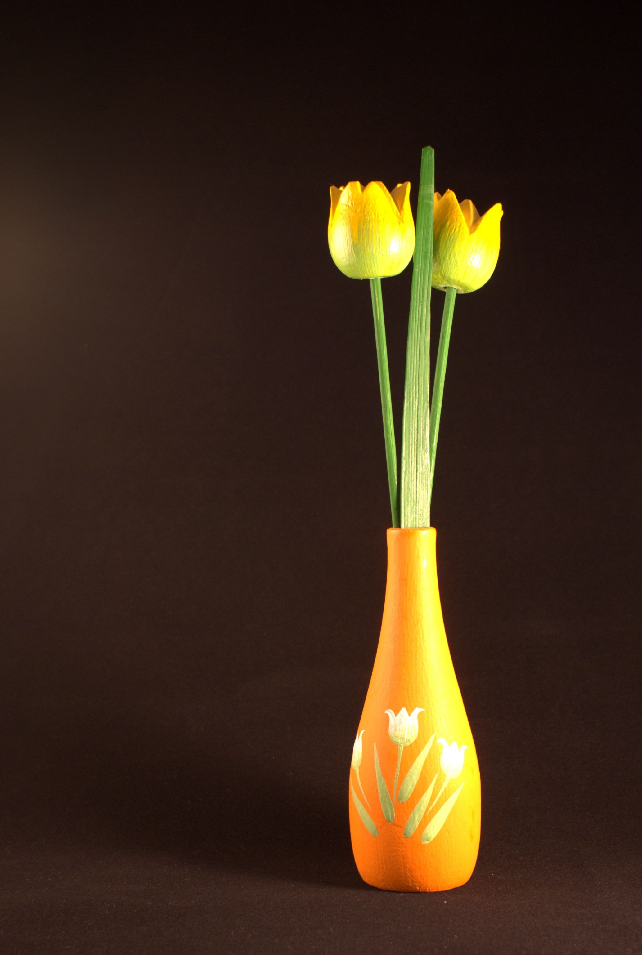 yellow decorative tulips with vase