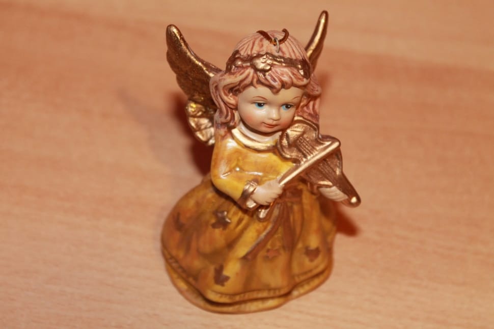 brown ceramic angel figurine preview