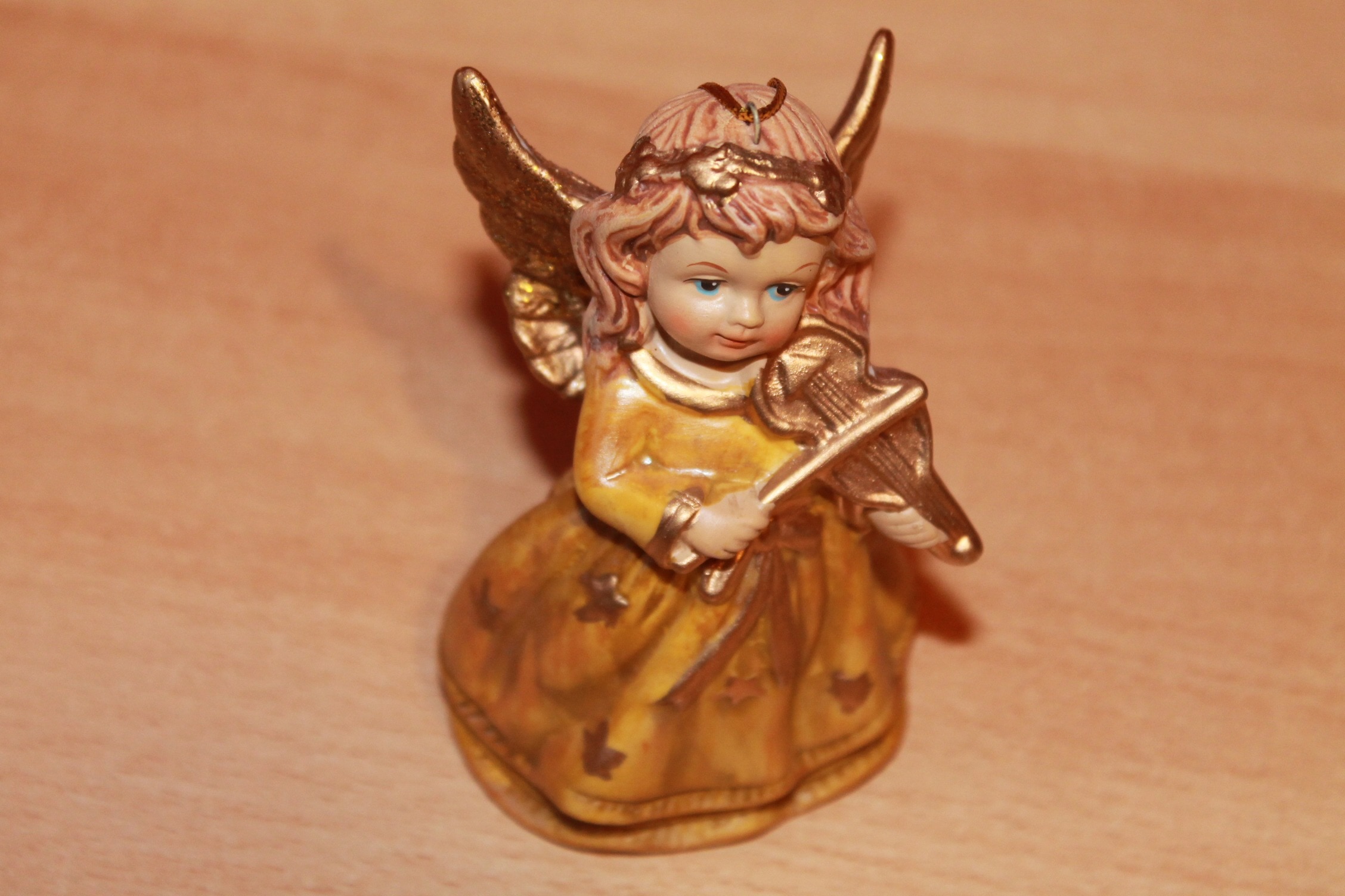 brown ceramic angel figurine