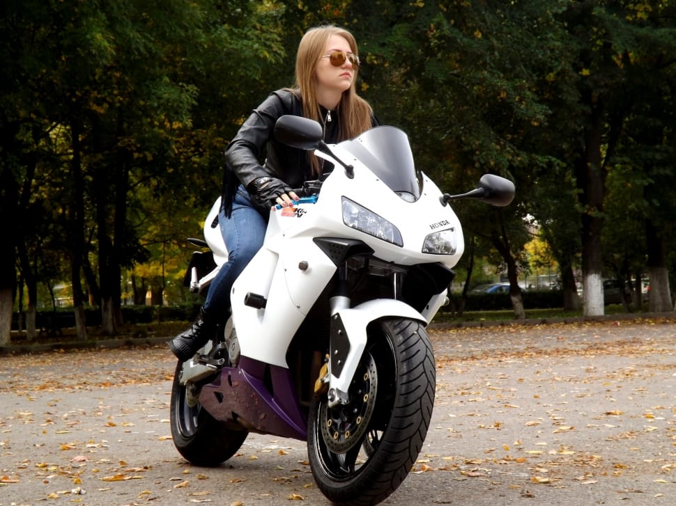 white and black sport motorcycle preview