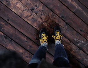 pair of black gray and yellow sneakers thumbnail